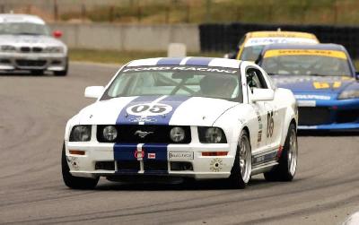 Ferrari, Porsche, Lamborghini Pilotage d'une Mustang GT ou Cayman S au circuit La Ferté